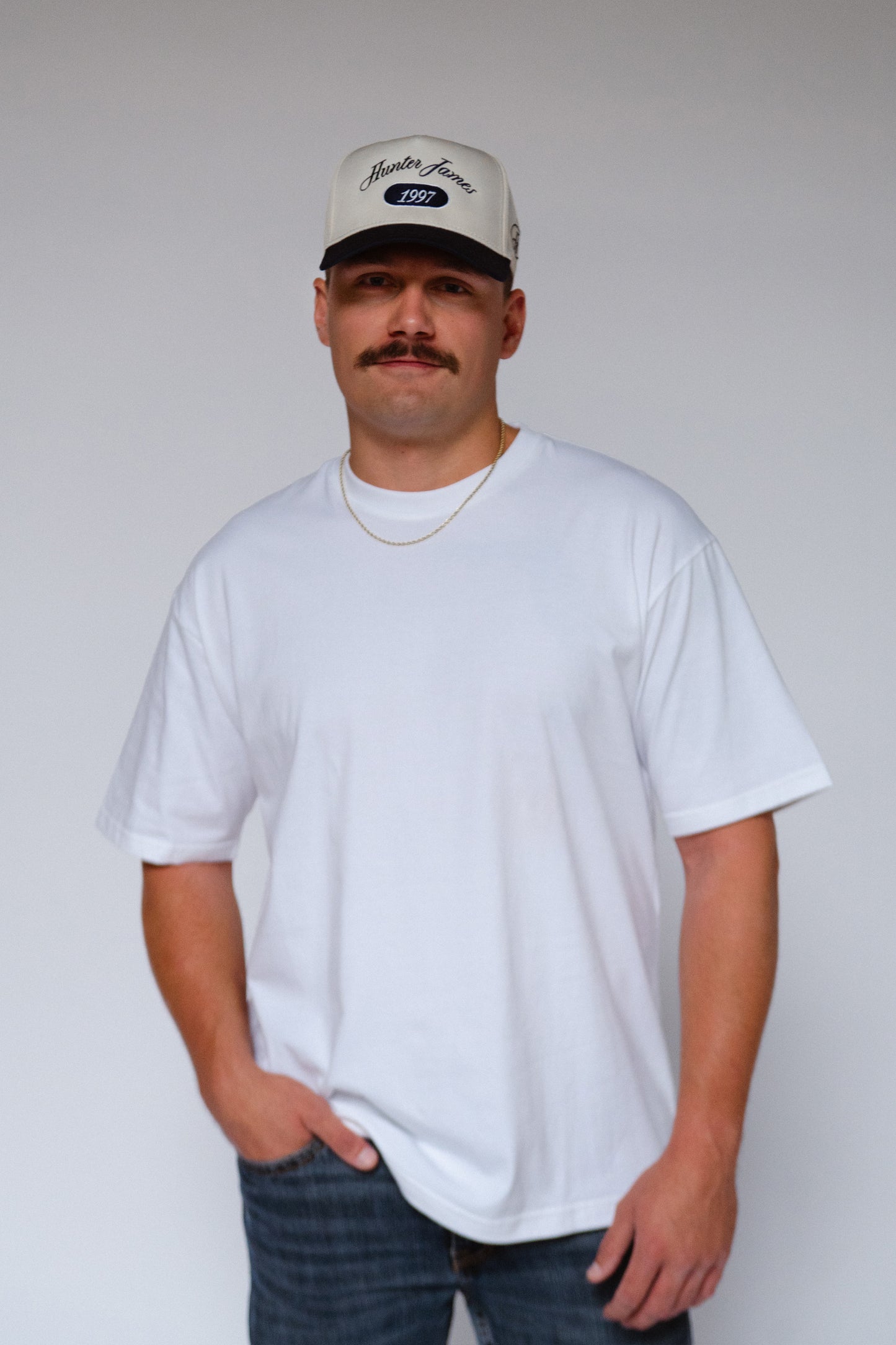 CARLE TRUCKER HAT | NAVY & NATURAL