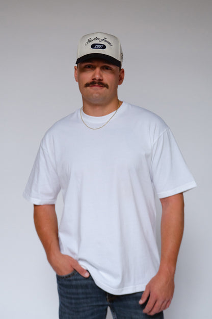 CARLE TRUCKER HAT | NAVY & NATURAL