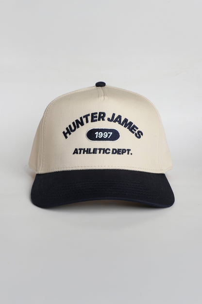 HUBER TRUCKER HAT | NAVY & NATURAL